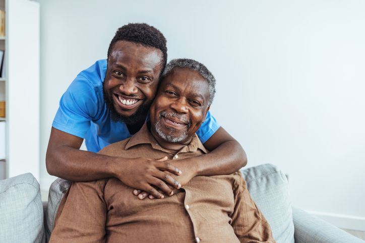 Smiling patient with his son